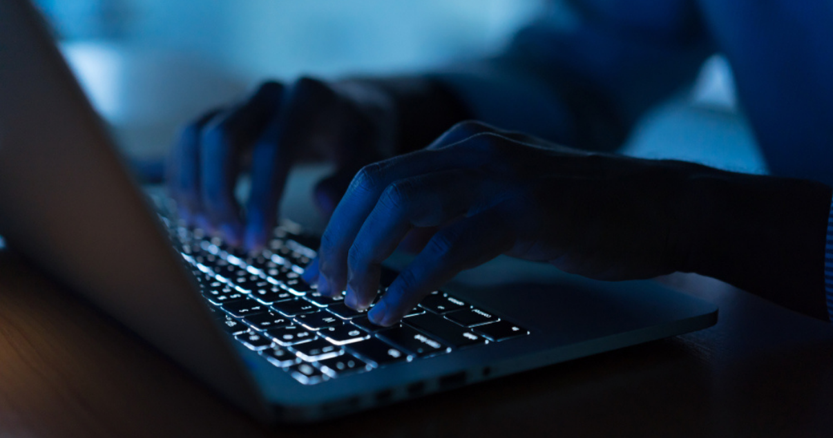 ZirconTech, man working with hands on a laptop